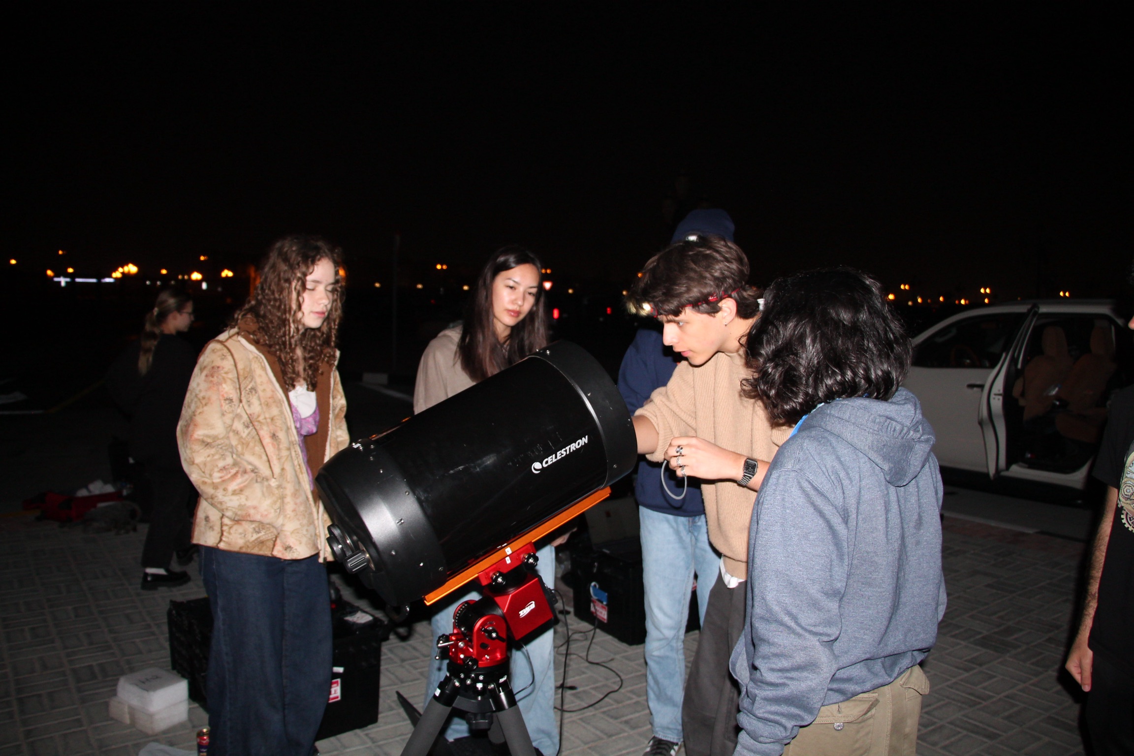 Occultation Group members assembling a telescope for observations